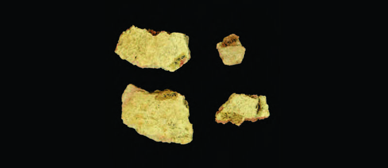 Fragments of pottery on a black background