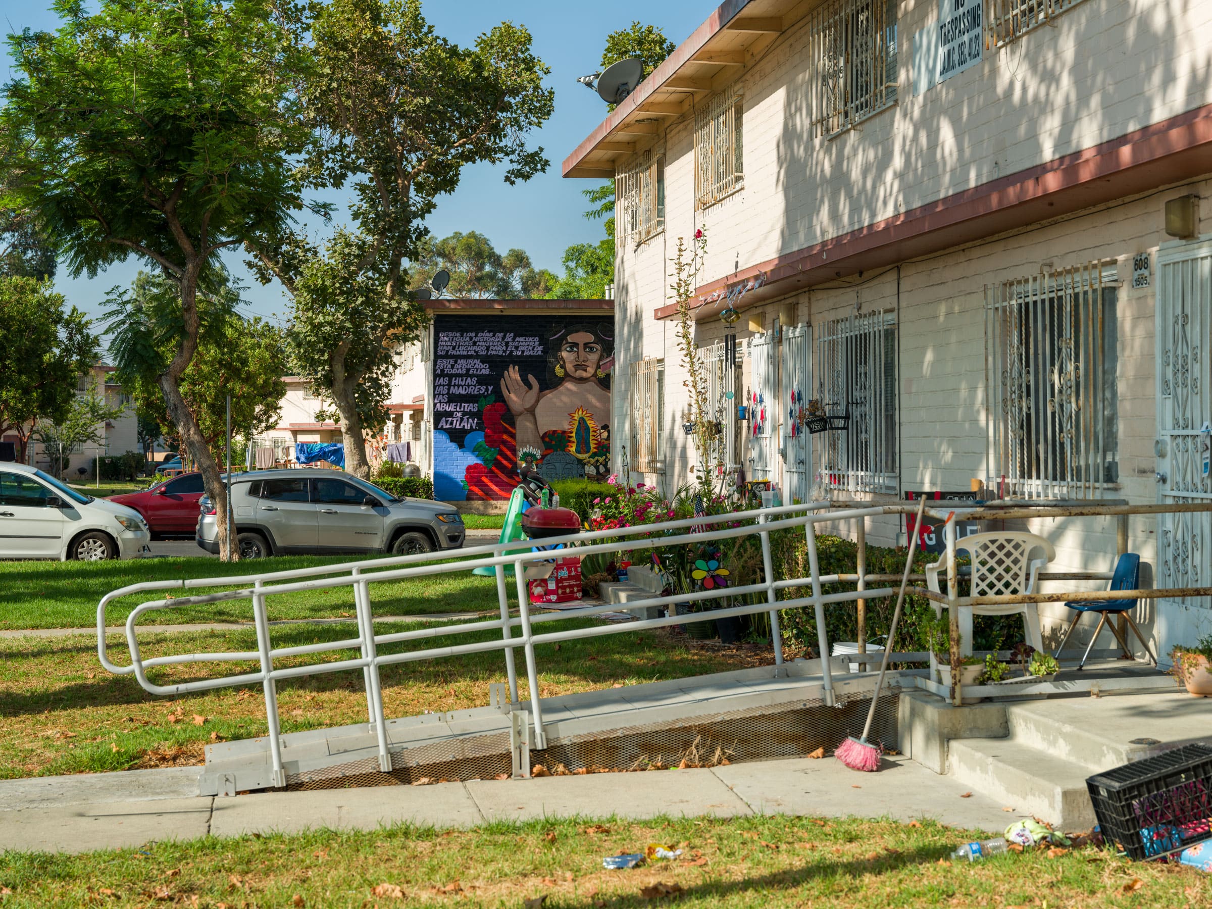 Ramona Gardens housing project with the Judithe Hernandez mural in the background.