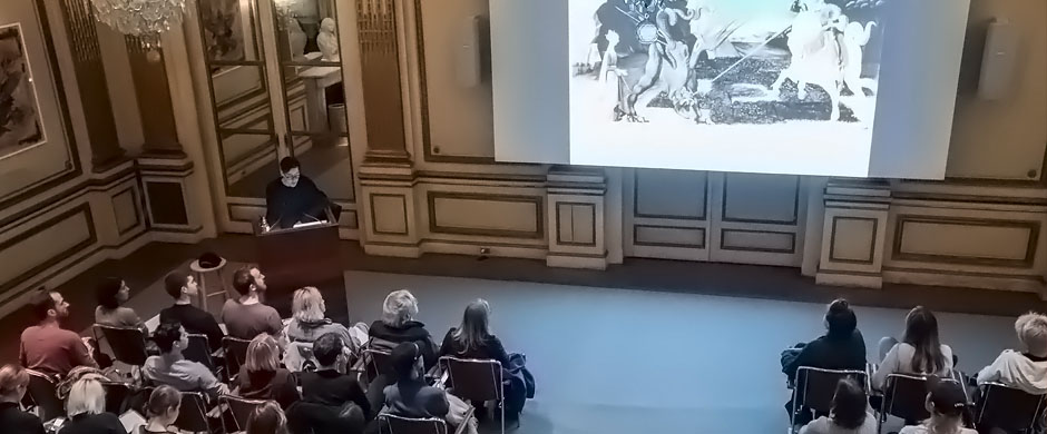 Photo of artist Nicole Eisenman in the Lecture Hall.
