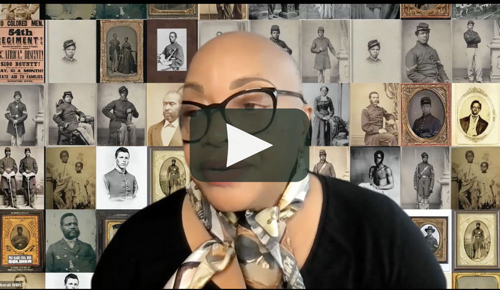 video still of Deborah Willis giving a Zoom talk with a background filled  with photos of black civil war soldiers